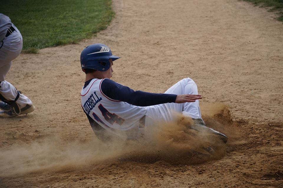 Malcolm Hubbell scores in the fifth inning vs. John Bowne