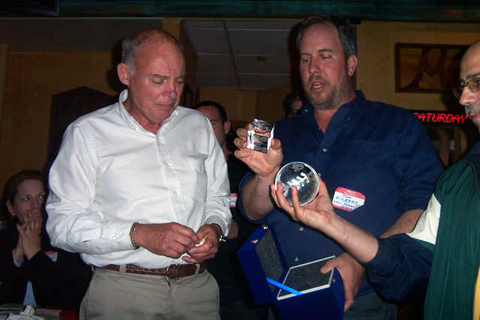 Coach Charles Sharkey receives engraved glass award from Tom Gilbert, Treasurer of the Friends of Stuyvesant Baseball.