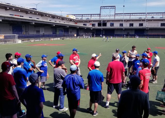 Coach Carlesi gesturing to left field