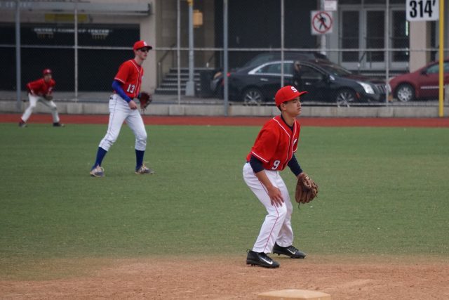 Franklin Liou manning third base